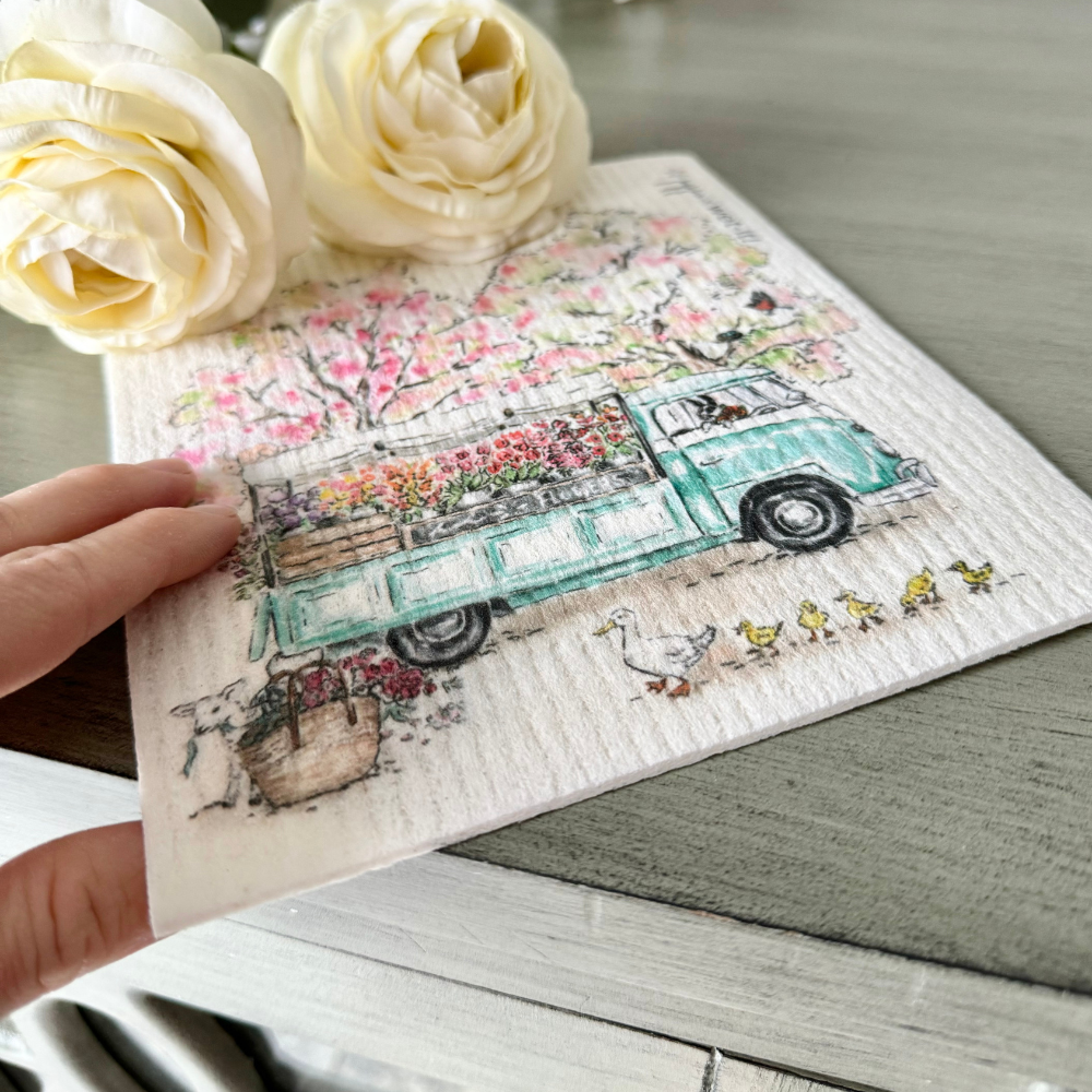 flower truck with spring bloom trees and baby animals swedish dish cloth for spring cleaning